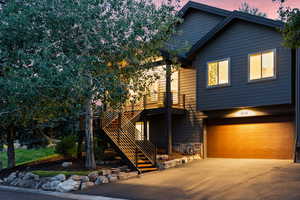 View of front of property featuring a garage