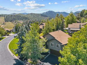 Birds eye view of property featuring a mountain view