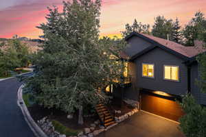 View of front facade featuring a garage