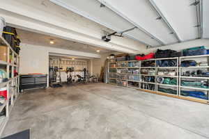 Garage featuring a garage door opener