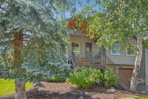 View of property hidden behind natural elements