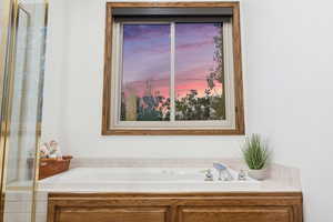 Bathroom with a tub to relax in