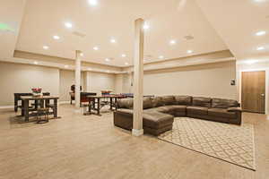 Living room with light wood-type flooring