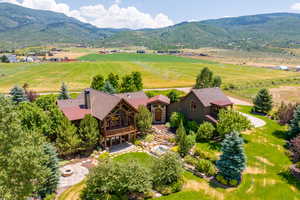 Aerial view with a mountain view and a rural view