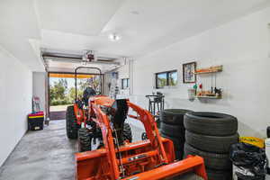 Garage featuring a garage door opener