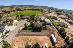 Birds eye view of property featuring a mountain view