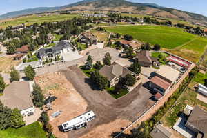 Birds eye view of property featuring a mountain view