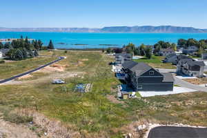 Bird's eye view featuring a water and mountain view