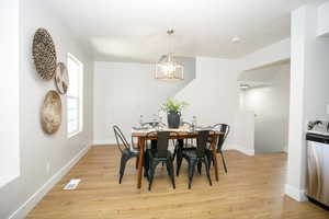 Dining space featuring light hardwood / wood-style floors