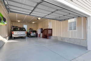 Garage featuring a garage door opener