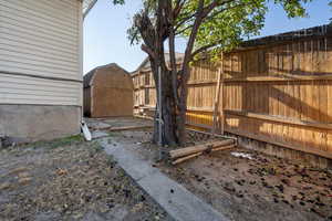 Side yard showing shed #2 shed #3 is on the other side.