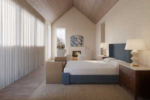 Bedroom with lofted ceiling and wood ceiling