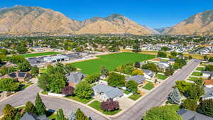 Birds eye view of property with a mountain view