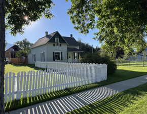 View of front of house with a front yard