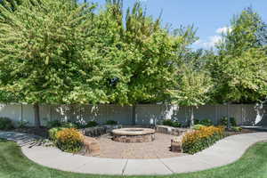 View of front of property with a fire pit