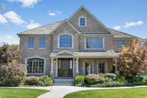 View of front of property featuring a front lawn