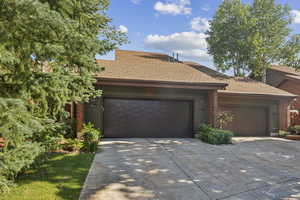 View of front of home featuring a garage