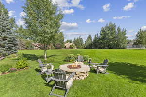 View of yard featuring a fire pit