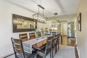 Dining room with hardwood / wood-style flooring