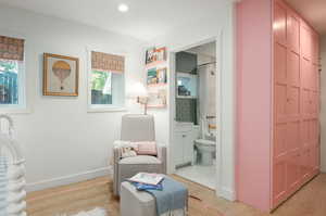 Living area with light wood-type flooring