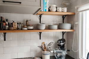 Interior details featuring decorative backsplash