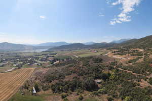 Property view of mountains featuring a rural view