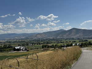 Property view of mountains with a rural view