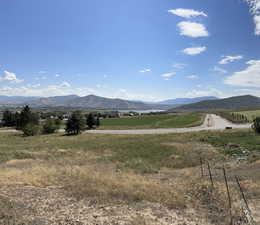 View of mountain feature with a rural view