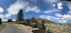 View of street with a mountain view and a rural view