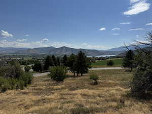 Property view of mountains featuring a rural view