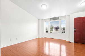 Foyer with light wood-type flooring