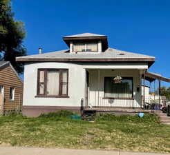 Front of home with large patio