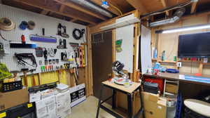 Basement featuring a workshop area