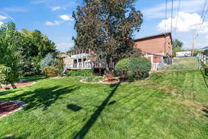 View of yard featuring a deck