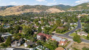 Birds eye view of property with a mountain view