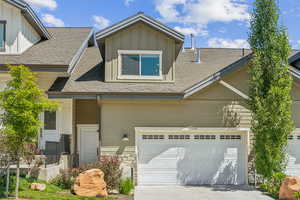 View of front facade with a garage