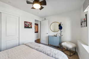 Bedroom featuring a closet and ceiling fan