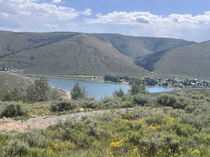 View of mountain feature with a water view