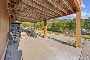 View of patio / terrace featuring cooling unit