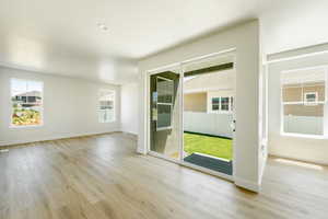 Interior space featuring light wood-type flooring. 2411 S.