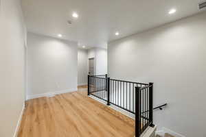 Landing featuring light hardwood / wood-style floors. 2425 S.