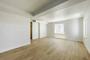 Living room featuring light wood-type flooring. 2425 S.