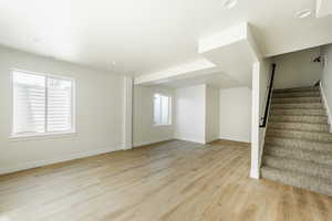 Living Room with light wood-type flooring. 2425 S.