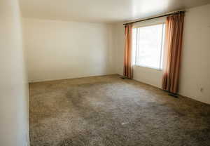 View of carpeted spare room