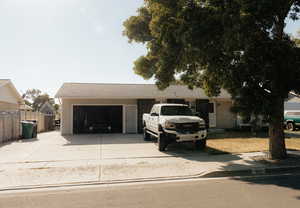 View of front of home featuring a garage