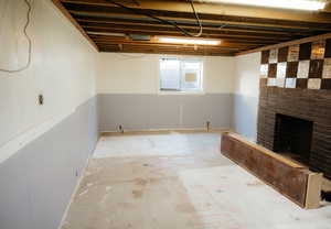 Basement with a fireplace