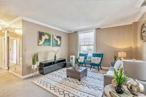 Spacious living room with beautiful crown molding