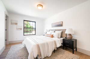 Bedroom with light wood-type flooring