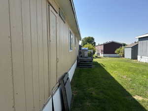 View of yard featuring a storage shed