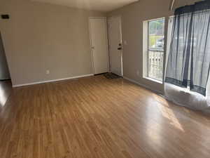 Empty room featuring light hardwood / wood-style floors